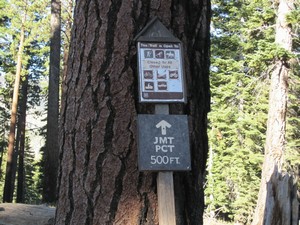 Sign after you pass the stables pointing back to trail Reds Meadow JMT sign